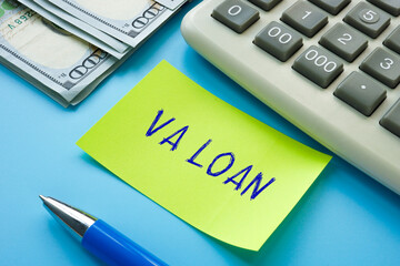 Business concept about VA LOAN Veterans Affairs home loan with sign on the piece of paper.