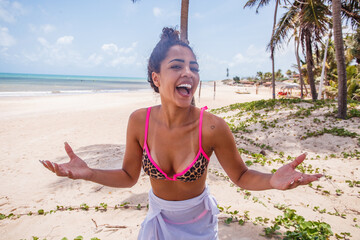 Wall Mural - Afro woman, beautiful, wearing bikini, at the beach, With open arms saying welcome