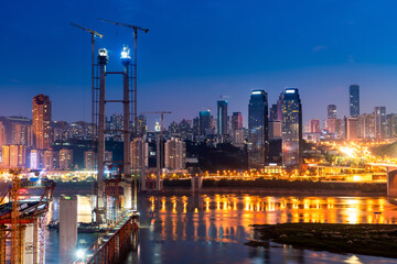 Poster - cityscape and skyline of downtown near water of chongqing at night