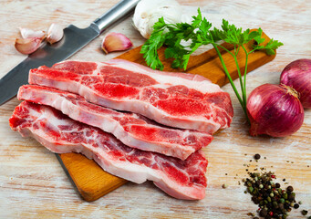 Raw churrasco, thin slices of beef rib meat, popular ingredient for grilled meat in Spain
