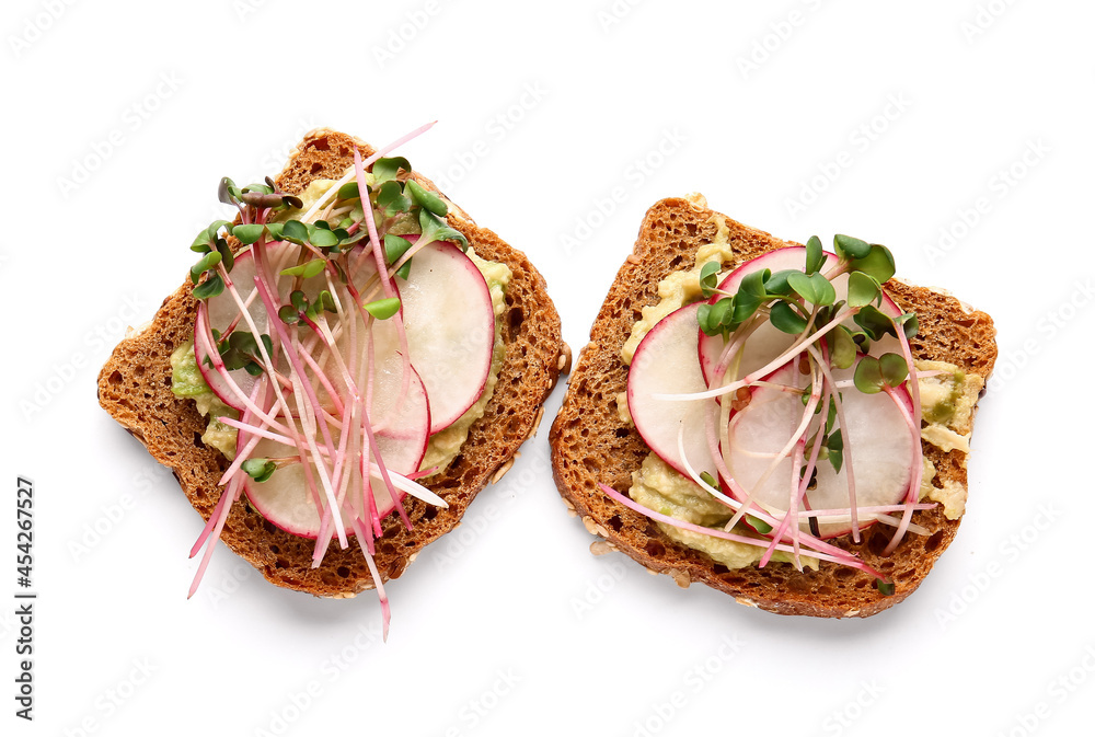 Tasty sandwiches with radish and micro green on white background