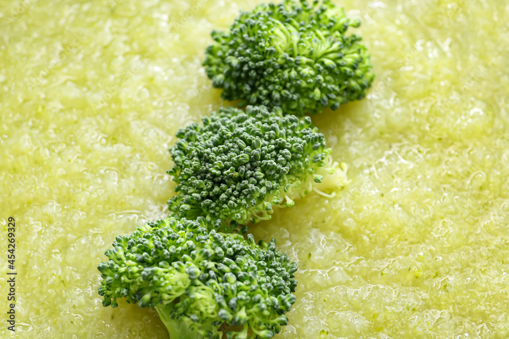 Texture of tasty broccoli cream soup, closeup