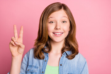 Sticker - Photo portrait girl showing v-sign gesture smiling isolated pastel pink color background