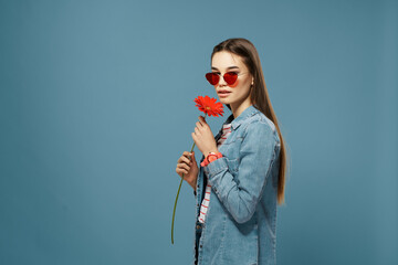 Wall Mural - pretty brunette wearing sunglasses red flower decoration luxury