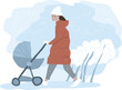 Young woman walking with a baby bassinet stroller in winter. Mother and child walk in the park.