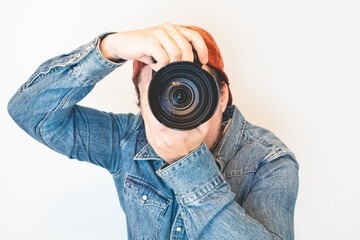 Poster - Man wearing denim taking a photo isolated on white background