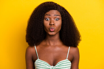 Poster - Photo of pretty adorable wavy dark skin lady wear striped singlet sending you kiss isolated yellow color background