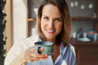 © ksenija1803z - portrait of woman with mug of coffee in her hands