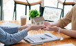 © NAMPIX - Rental and insurance concepts. Real estate agent gives the house to a new owner's client