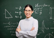 © Chanakon - Young asian teacher woman teaching standing with arms crossed video conference with student. Female teacher training the mathematics in classroom blackboard from online course.