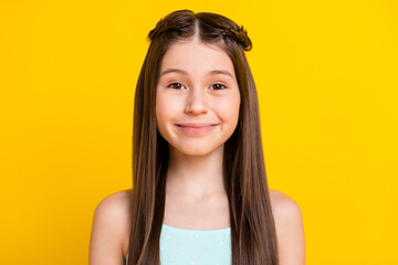 close-up portrait of pretty cute glad cheerful girl daughter isolated over bright yellow color backg
