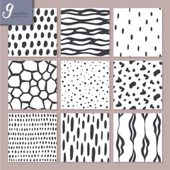 Wall Mural - Set of nine hand drawn seamless abstract patterns in black and white colors.