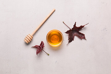 Wall Mural - Honey or maple syrup in a bowl.
