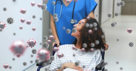 Canvas Print - Animation of coronavirus cells over female doctor with pregnant patient in wheelchair