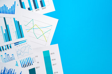 Poster - Office workplace table with report pages with financial data
