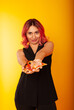 © Marina Chernivetskay - a girl holds out a fast food pizza in her hands to the camera holding directly into the frame
