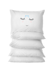 Poster - Stack of soft pillows, one with cute face on white background