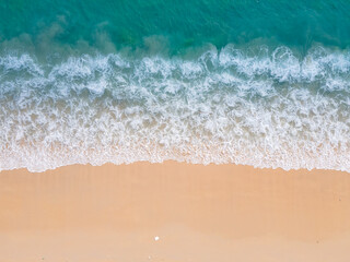 Wall Mural - (Top view) Aerial view drone over beach sea. Beautiful sea waves. Beach sand and amazing sea. Summer sunset seascape. Phuket Thailand Beach. Water texture. Top view of the fantastic natural sunsets