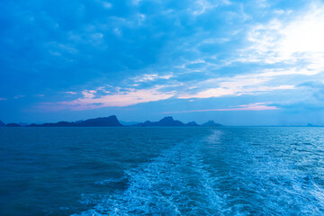 Wall Mural - Blue sunset sky over the sea of a tropical island