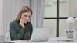 © stockbakers - Young Woman having Toothache While Drinking Coffee at Work