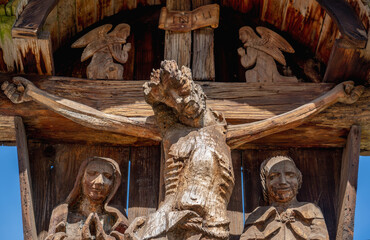Wall Mural - Very ancient wooden statue of crucifixion of Jesus Christ.