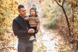 © Petro - Father holding his son in park