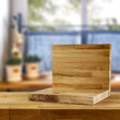 Pedestal of free space for your product and blurred background of home interior. 