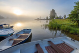 Fototapeta Pomosty - Early morning. Fog on the river. Beautiful sunrise in the summer by the river. boats at the pier.