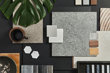 flat lay of creative architect moodboard composition with samples of building, textile and natural m