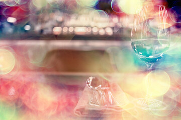 Wall Mural - evening in a restaurant, blurred abstract background, bokeh, alcohol concept, wine glasses in a bar