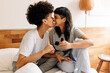 © (JLco) Julia Amaral - Couple celebrating their engagement at home