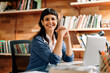 © (JLco) Julia Amaral - Happy businesswoman smiling at the camera