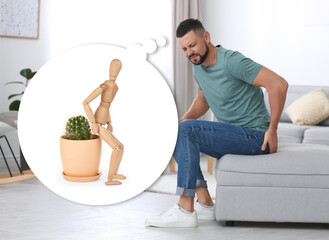 Wall Mural - Hemorrhoid problem. Man suffering from pain in living room