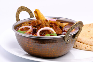 Mutton curry or meat dish with India style bread