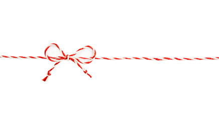 Wall Mural - Red twine rope isolated on white background, christmas package. A string of rope with a bow.