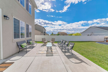 Wall Mural - Large outdoor patio with chairs and table on the rug