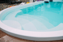 Fiberglass Pool In The Hotel Courtyard. The Pool Is Filled With Clean Clear Water