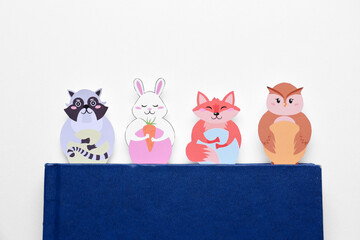 Wall Mural - Cute bookmarks with book on white background