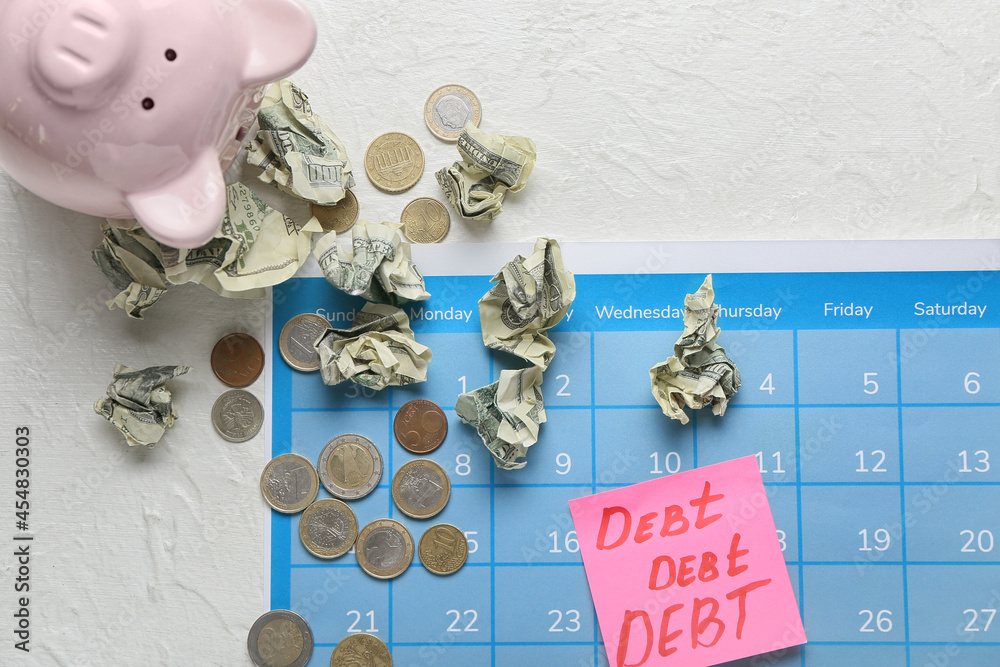 Paper with words DEBT, money and calendar on white background