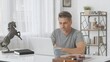 © nyul - Happy older man with gray hair working at home in home office with laptop computer.
