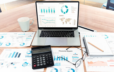 top view mock up sales summary slide show presentation on display laptop with calculator ,glasses an