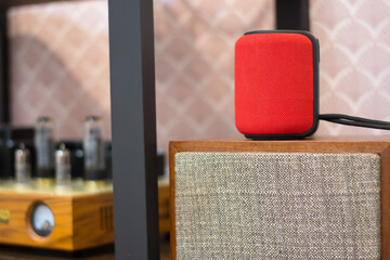 Social media,Multimedia speaker,Musical stereo speakers wooden in the interior of a bright room. Musical concept.