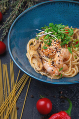 Sticker - Tom Yum pasta with shrimp. Thai dishes. Spaghetti Tom Yum Goong, a fusion of Italian food.