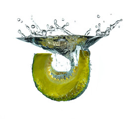 Wall Mural - pumpkin cut into the water against white background