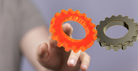 Poster - Cyborg hand holding a gear wheel interface 3d rendering.