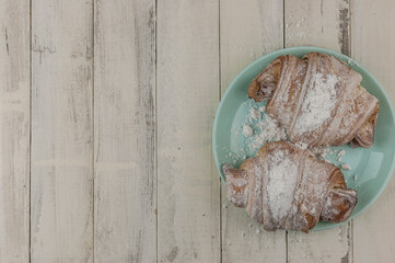 Wall Mural - Croissant on plate in the restaurant