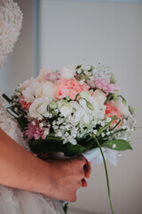 Sticker - Vertical shot of a bridal bouquet with the bride hand detail