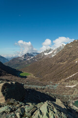 The Ayas valley and the Piani di Verra inferiori seen from the high point of view of the blu lake on the Mount Rose in northern Italy near Aosta