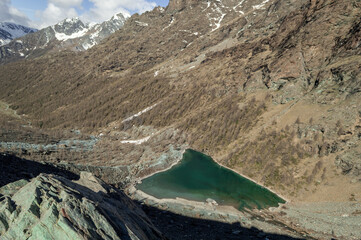 Landscape panoramic view of the Blu lake and the Ayas Valley in the Alta Via of Monte Rosa near Champoluc in the italian Alps