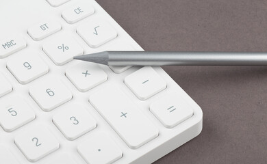 Aufkleber - Calculator and pen on the grey background. Business concept
